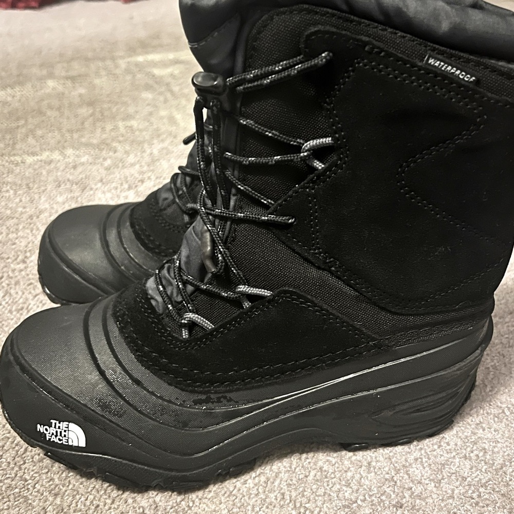 Gently used big boys North Face boots